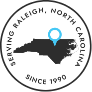 Shape of North Carolina with map pin on Raleigh and text saying Serving Raleigh North Carolina Since 1990